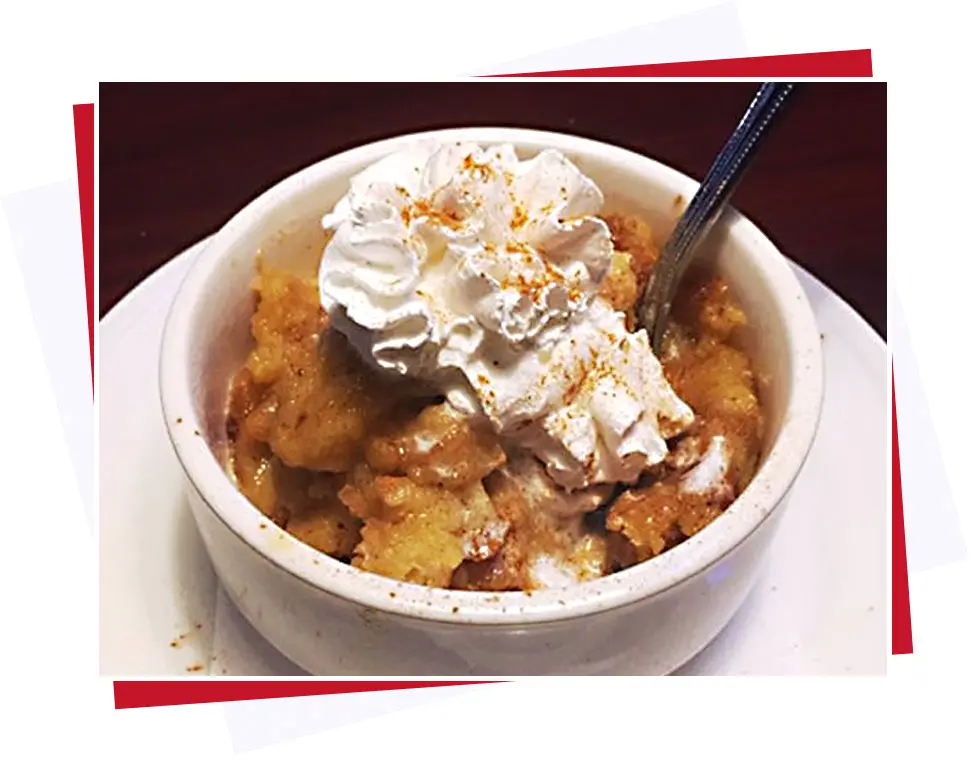 Dessert in a bowl with whipped cream 